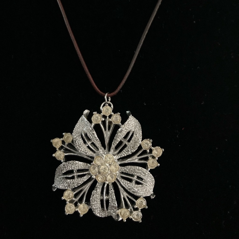 Brown leather cord, silver tone/rhinestone pendant necklace